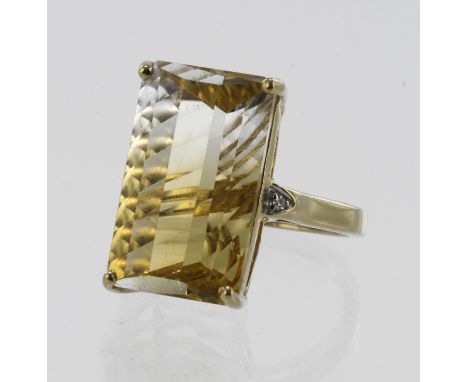 9ct yellow gold diamond and bicolour citrine cocktail ring, one step cut citrine measuring 18mm x 11mm, flanked with one diam