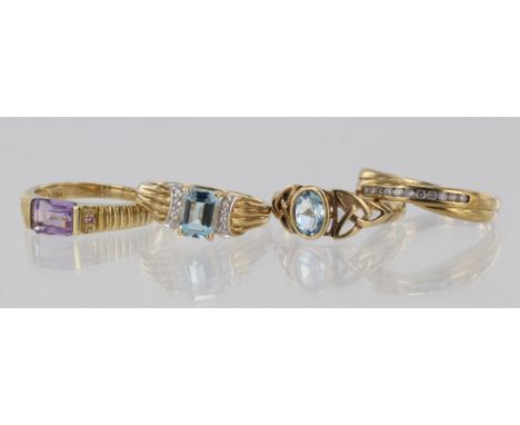 Four 9ct yellow gold gem set rings, stones include diamond, blue topaz, amethyst, finger sizes N, N/O, P/Q, Q/R, total weight