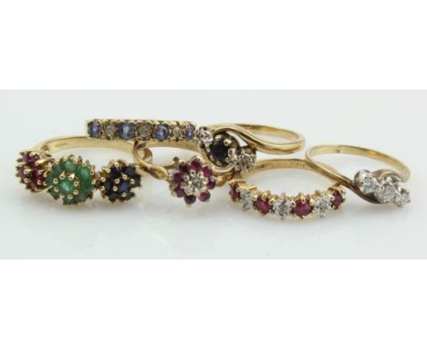 Six 9ct gold gem set rings, stones include diamond, ruby, sapphire and emerald, finger sizes I/J, J/K, K/L, L, M, N/O, total 