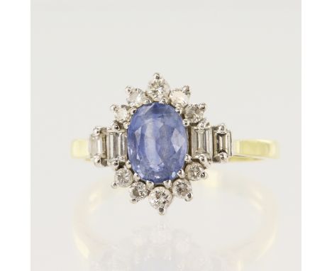 18ct yellow gold diamond and sapphire cluster ring, one oval sapphire approx. 7mm x 5mm, surrounded by ten graduated round br