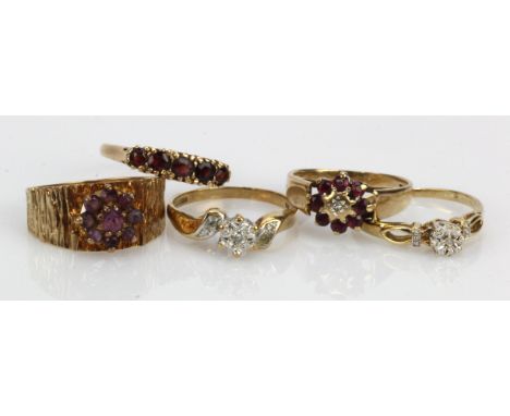 Five 9ct gold rings, stones include diamond, ruby, garnet, amethyst, stone sizes J/K, M/N x3, O, total weight 11.1g.