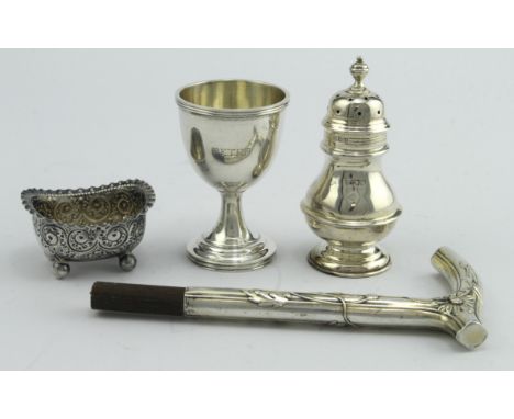 Mixed lot of silver comprising three British hallmarked items: a silver pepper (London 1904), a silver salt (Sheff 1894) and 