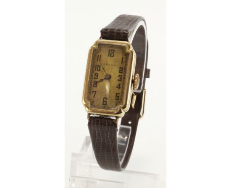 Gents 9ct cased Rolex manual wind wristwatch. The gilt guilloche dial with black Arabic numerals, outer minute track and blac