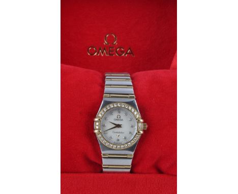 Omega Constellation 18ct gold and stainless steel quartz ladies wristwatch, ref. 12677500, purchased 2003. The mother of pear