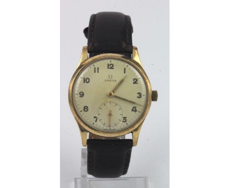 Gents 9ct cased Omega manual wind wristwatch circa 1948. The cream dial with arabic numerlas and subsidiary second dial at 6 