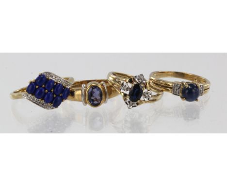 Four 9ct gold/tests 9ct gold gem set dress rings, stones include diamond, sapphire, lapis lazuli, iolite, finger sizes M, N x