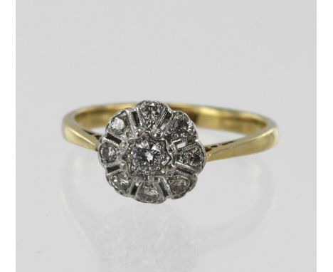 Yellow gold (tests 18ct) vintage diamond cluster ring, principle round brilliant cut approx. 0.10ct, surrounded by eight diam