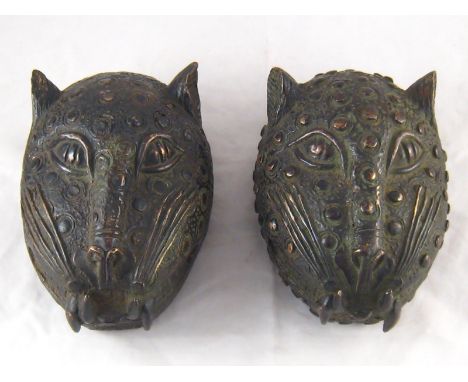 A pair of Benin bronze leopard's heads, Nigeria. 20x13cm. 