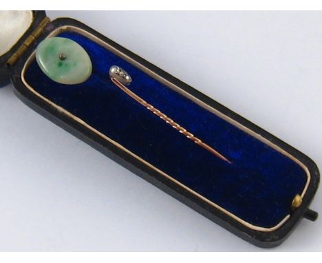 A mixed lot comprising a jade stick pin and a rose cut diamond stick pin, gross weight 3.2gms.