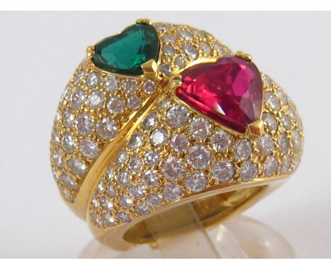 Boucheron . A fine 18 carat gold Columbian emerald, ruby and diamond ring by Boucheron, signed Boucheron and numbered MD2769.