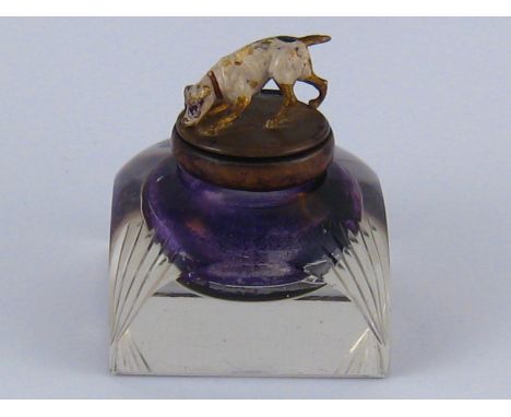 A glass inkwell, the lid with cold painted bronze dog as handle. 7x7x7.5cm. high. 