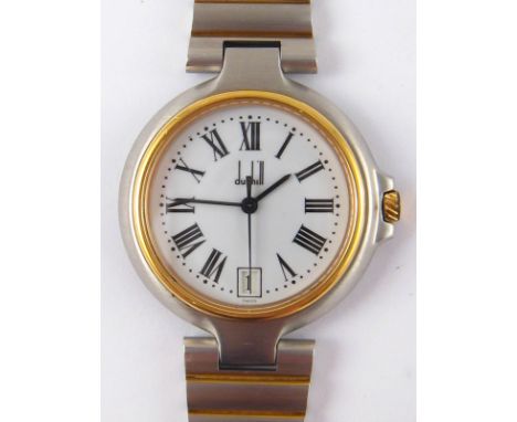 A lady's Dunhill stainless steel quartz watch with bracelet, sweep seconds hand and date aperture.
