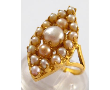 A yellow metal (tests 18 carat gold) marquise shape cultured pearl ring, approx 2.5cm long, ring size K, 4.8 gms.