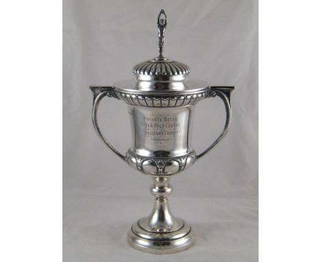 A large silver two handled lidded trophy cup, the finial a standing swimmer, Birmingham, 1929. Ht.40cm. wt. 1,009gm. 