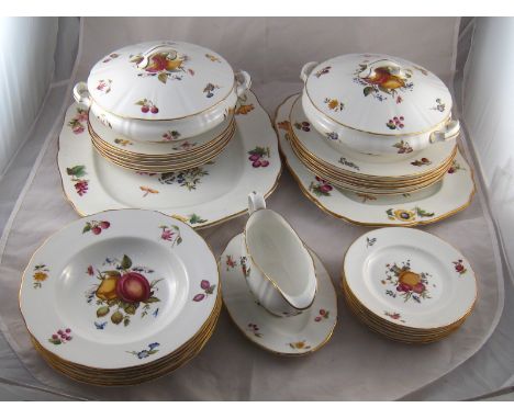 Royal Worcester. A complete dinner service for six comprising six each soup, dinner, dessert and side plates, two covered veg