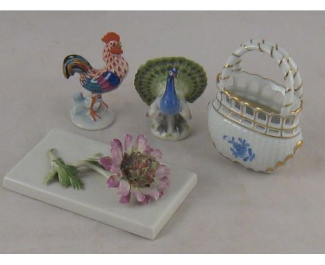 Four ceramic items, a Herend basket vase, ht.9cm.,a Herend cockerel, ht.7cm. a Meissen peacock, ht.5.5cm., and a flower paper