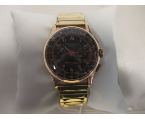 A gentleman's gold cased wristwatch chronograph, by Teka with associated strap, the case stamped 750  