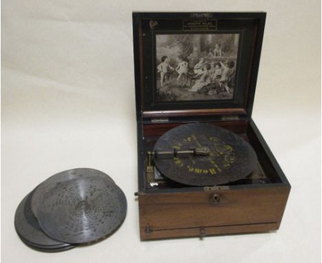 A wooden cased polyphon retailed by Joseph Riley and with a single 25cm diameter disc  