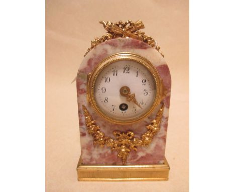 An early 20th century French ormolu mounted marble round arch mantel clock, 14cm high  