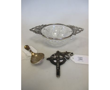 A rattail patterned caddy spoon, a silver mounted cut glass bowl and a crucifix  