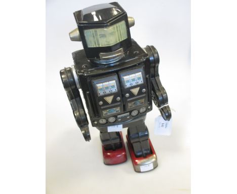 A battery operated metal robot made in Japan  