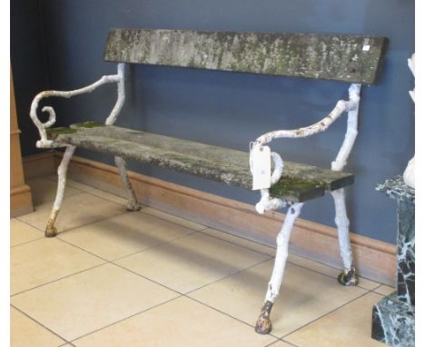 A white painted cast iron bench  