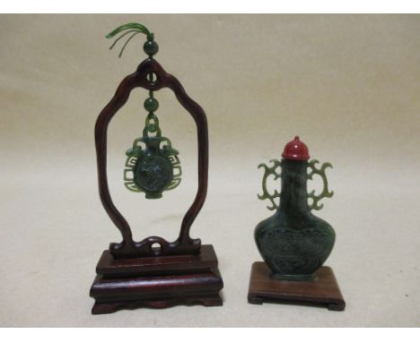 A jade two handled snuff bottle and a pendant  