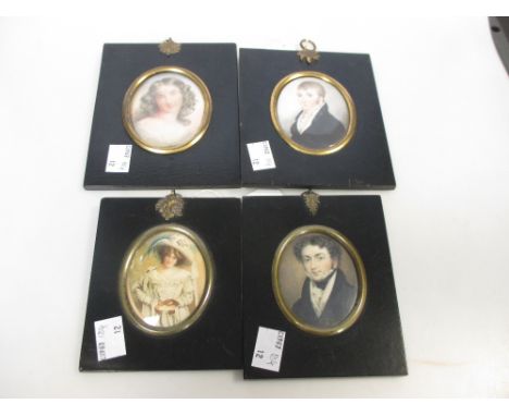 English School (19th Century) - Four portrait miniatures; a Gentleman in a black coat and white stock, with locks of hair ver