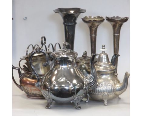 A box of plated wares, including a loaded silver vase, two others, a few spoons, and a box of odd flatware  