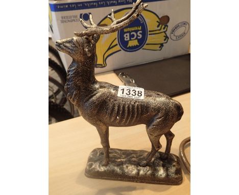 Cast iron standing Stag model, H: 30 cm. P&amp;P Group 1 (£14+VAT for the first lot and £1+VAT for subsequent lots) 