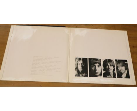 Beatles White album no 0176292 with poster. P&amp;P Group 1 (£14+VAT for the first lot and £1+VAT for subsequent lots)
Condit