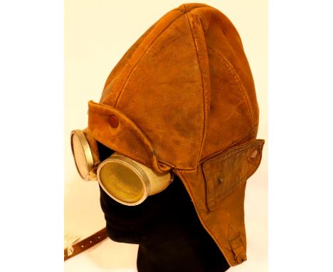 C1915 British R.F.C Leather Flying Helmet &amp; Tinted Goggles. The glass is quite clear with a few pts, a hand sewn field re