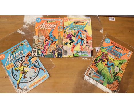 Four Superman action comics in good condition, 512, 519, 520 and 526. P&amp;P Group 1 (£14+VAT for the first lot and £1+VAT f