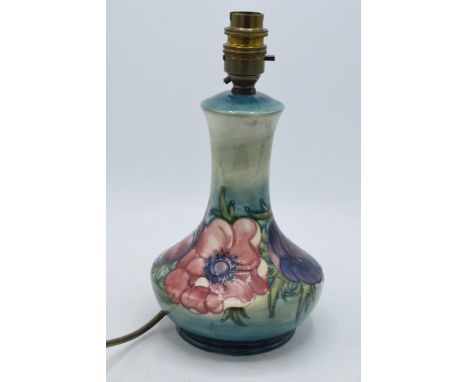 Moorcroft lamp base in the Clematis (or similar) pattern, 20cm tall exc. fittings.  In good condition with no obvious damage 