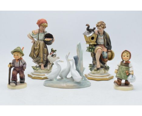 Pottery to include Capo Di Monte Cazzola figures, Nao swans and Goebel children figures (5).  In good condition with no obvio