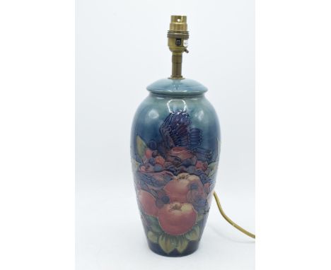 Large Moorcroft lamp base in Finch and Berry pattern, 26.5cm tall exc. brass fittings (cracked).  