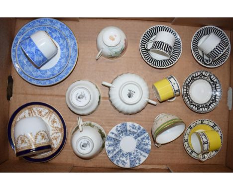 A collection of Royal Worcester tea ware to include cups and saucers to include a green gilt example, black and white duos, Q