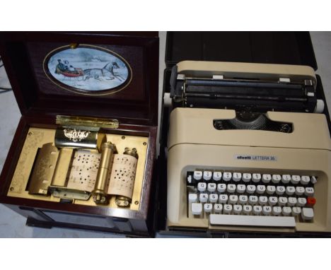 Cased Olivetti Lettera 35 vintage typewriter and a modern decorative music box (2).  Both untested.