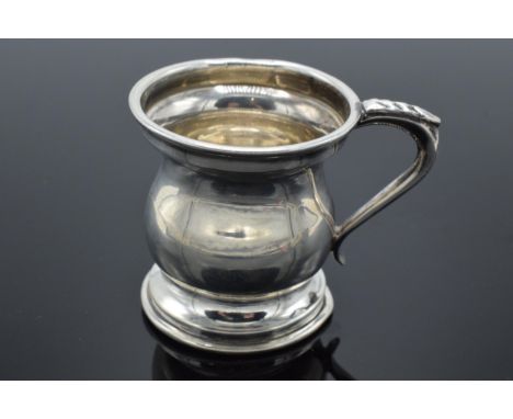 Hallmarked silver tankard in a Georgian style, 35.8 grams, Birmingham 1958, 5cm tall.  Dent to base rim.