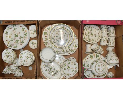 A large collection of Wedgwood Wild Strawberry tea and dinner ware to include a teapot, a coffee pot, bowls, dinner plates, c