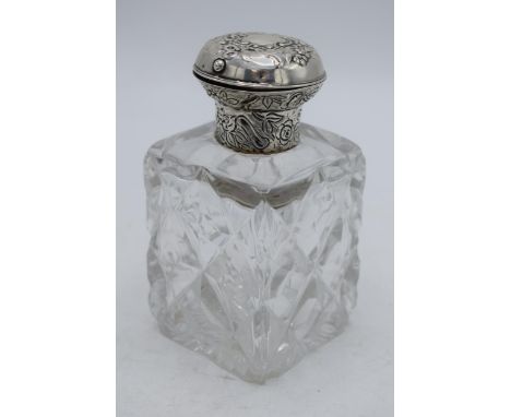 Hallmarked silver topped inkwell, William Comyns &amp; Sons, hallmarks rubbed, 14cm tall.  Chips to glass.