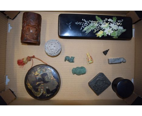 A collection of oriental items to include lacquer box, soapstone item, jade-style figures, dragon trinket box and others.  