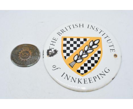 Vintage-style enamel sign 'The British Institute of Innkeeping', 23cm diameter, together with small oval 'Baggeridge 1989 Cou