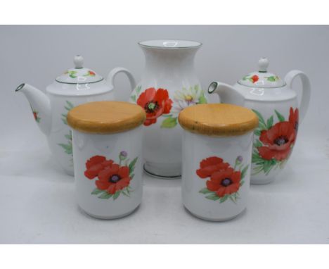 Royal Worcester Poppies tea ware to include 2 teapots, a vase and 2 storage jars (5).  In good condition with no obvious dama