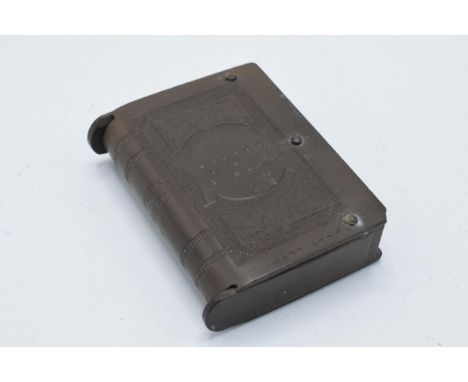 Vintage vulcanite match stick holder in the form of a book, 5.5cm long.  