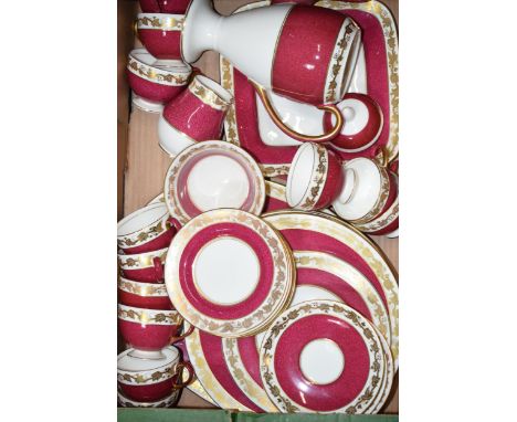 Wedgwood tea and dinner ware in the 'Whitehall' pattern to include a coffee pot, 12 cups, a platter, cake plate, saucers, sid