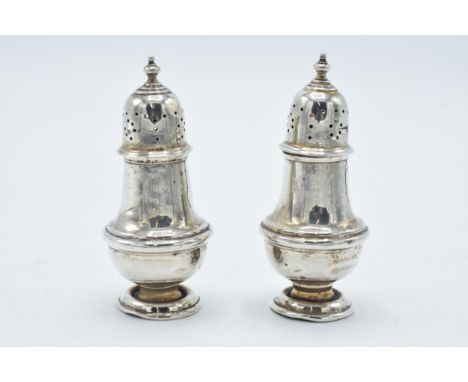 A pair of silver pepperettes, Birmingham 1906, 45.5 grams (2).  