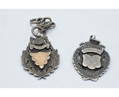 A pair of hallmarked silver fobs, 23.4 grams.  