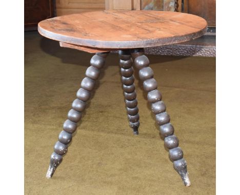 19th century tri-leg cricket table style item with bobbin turned legs, 57cm diameter, 53cm tall, with polished top.  Top appe