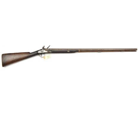 An early 19th century SB 16 bore flintlock sporting gun,  round barrel 49” with gold line and touch hole, the false breech en